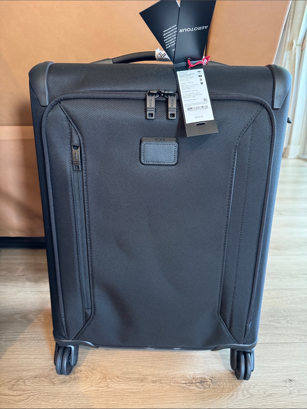 Tumi Black Softshell Spinner Carry-On